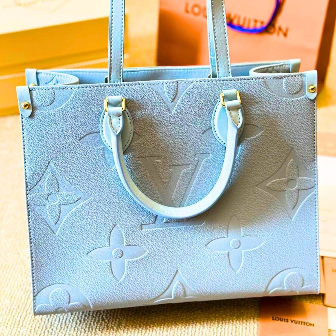 Embossed On The Go PM Handbag