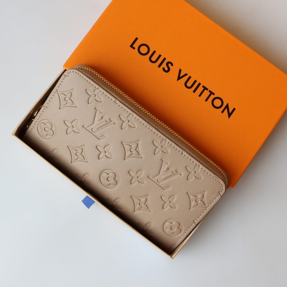 Embossed Zip Around Wallet