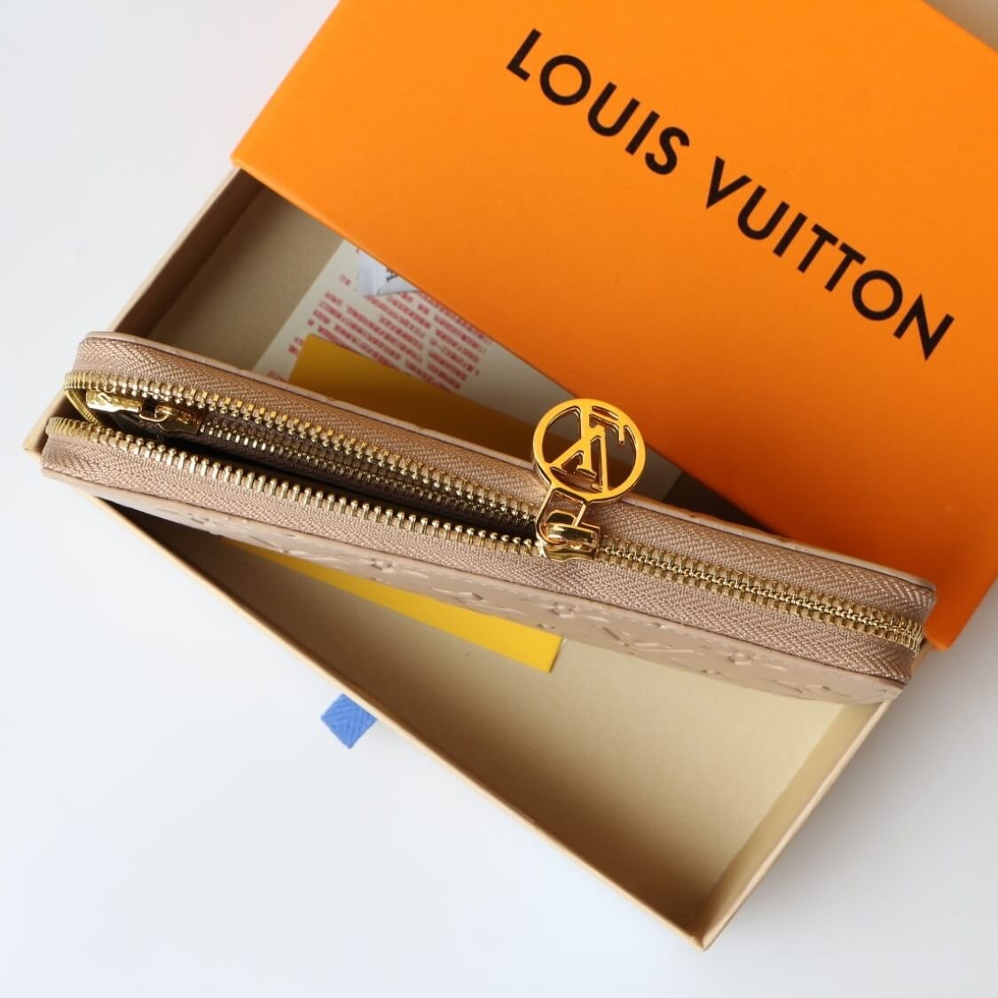 Embossed Zip Around Wallet