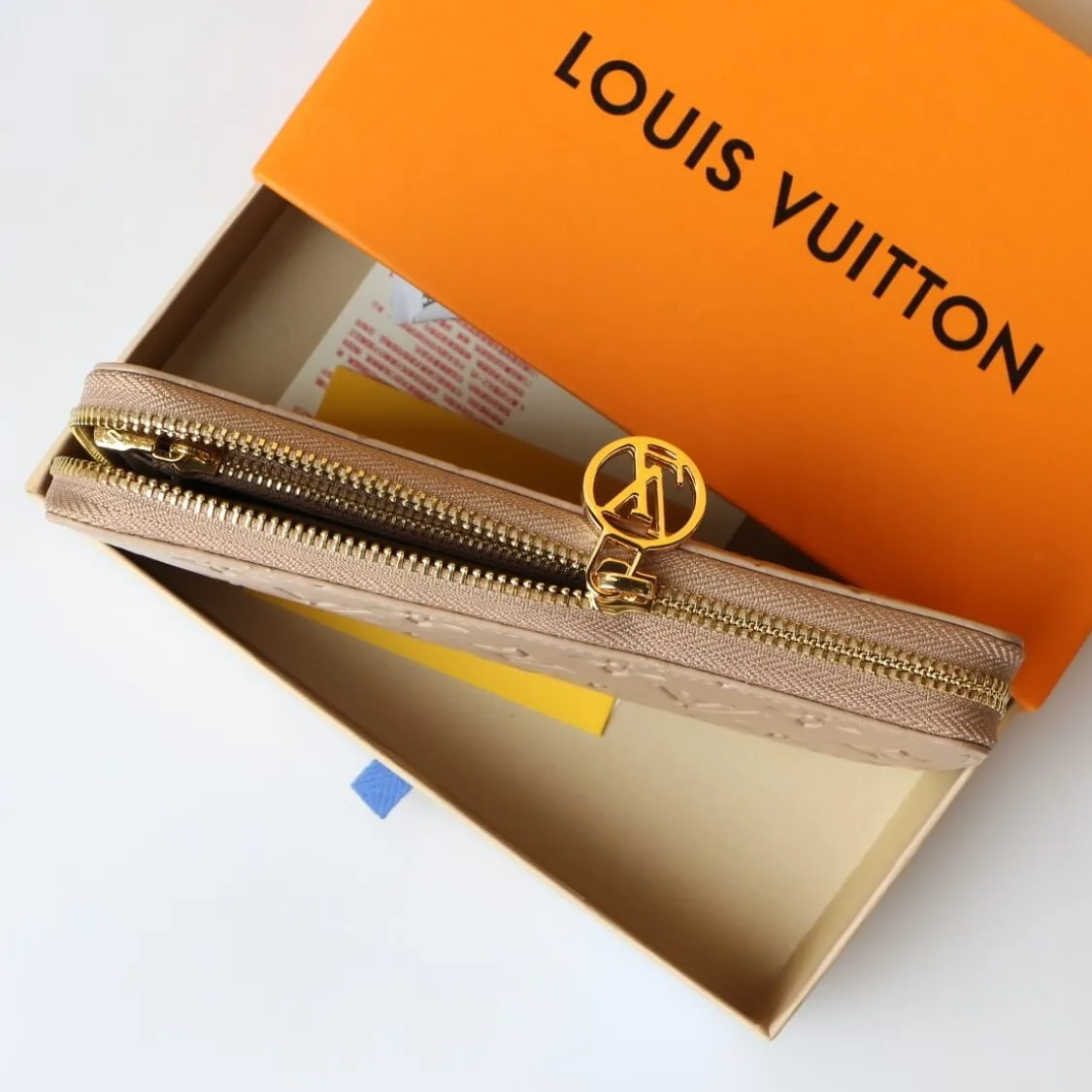 Embossed Zip Around Wallet
