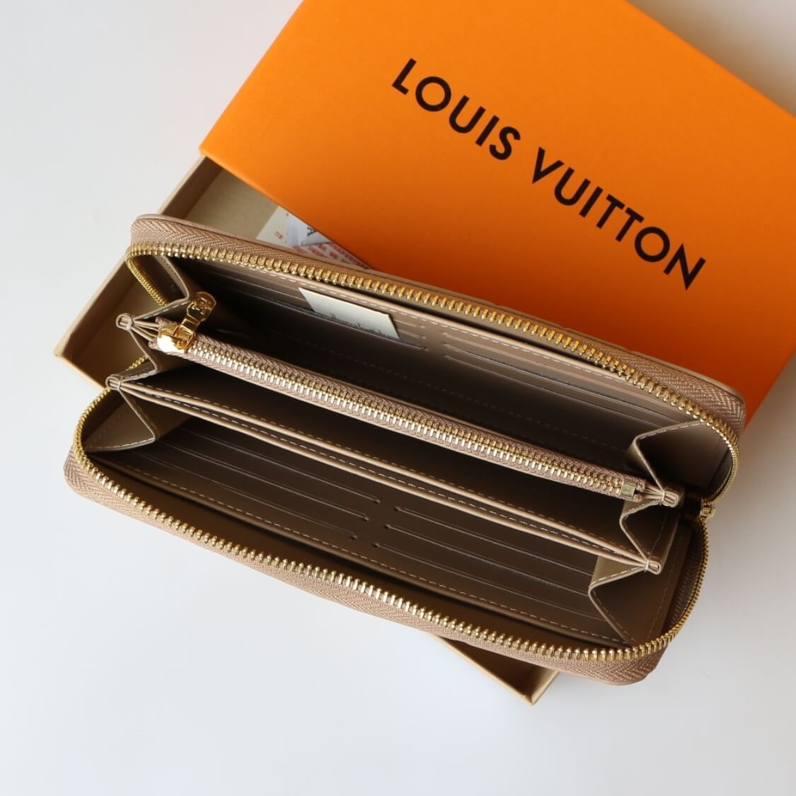 Embossed Zip Around Wallet
