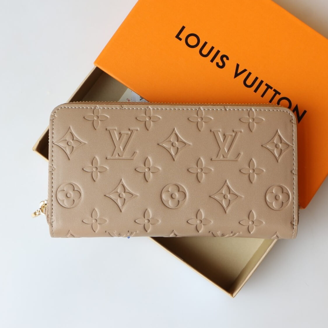 Embossed Zip Around Wallet