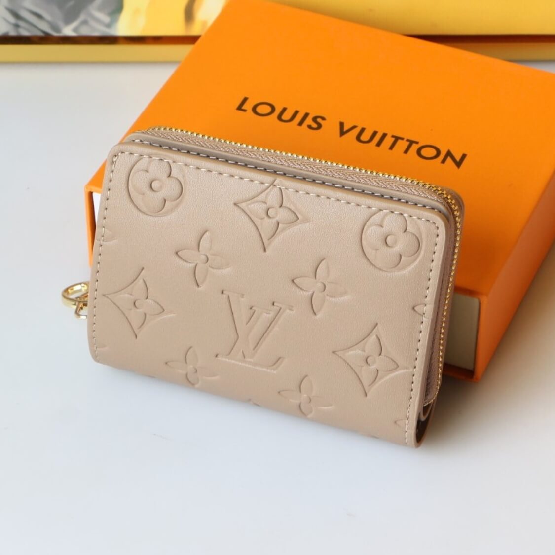 Small Embossed Zip Around Wallet
