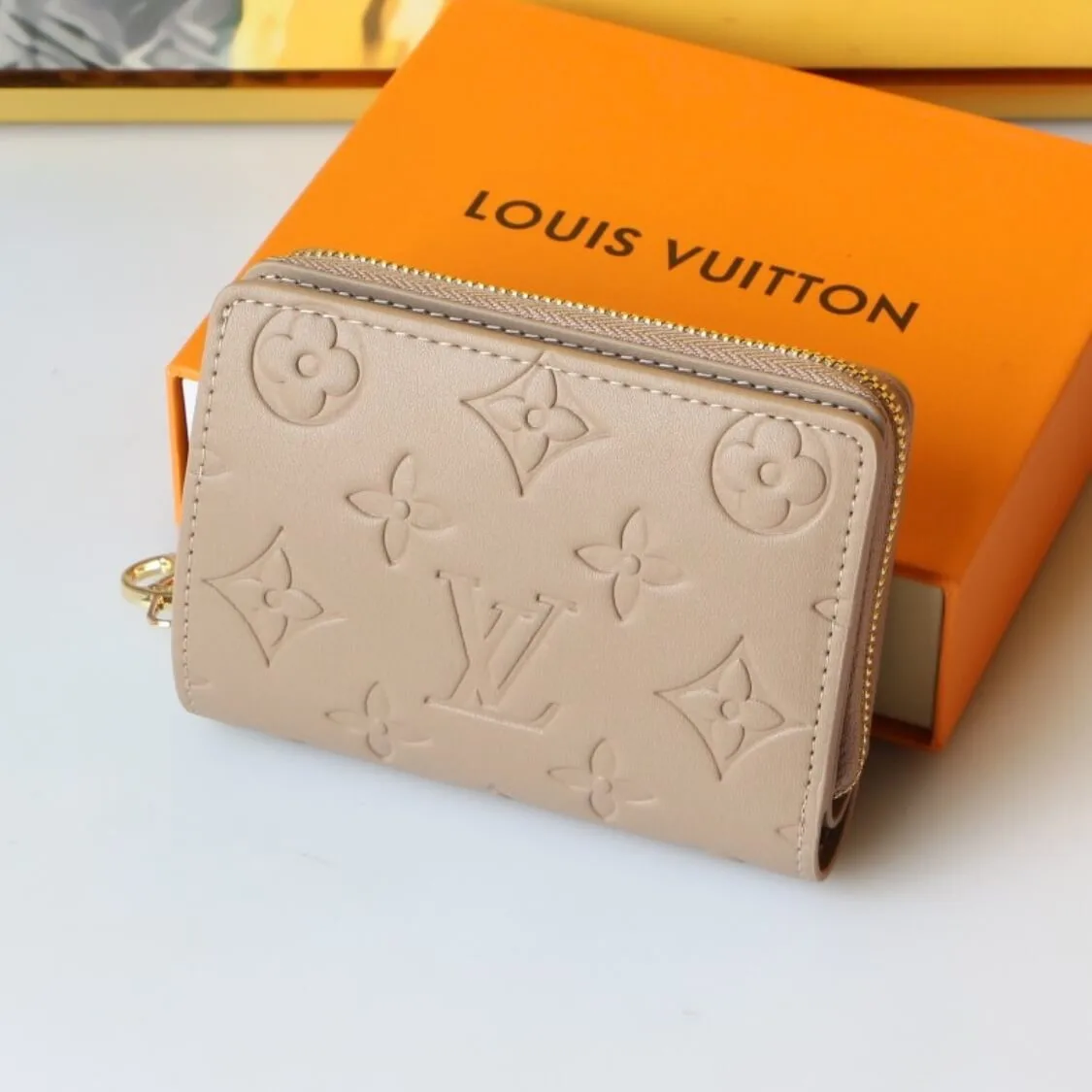 Small Embossed Zip Around Wallet