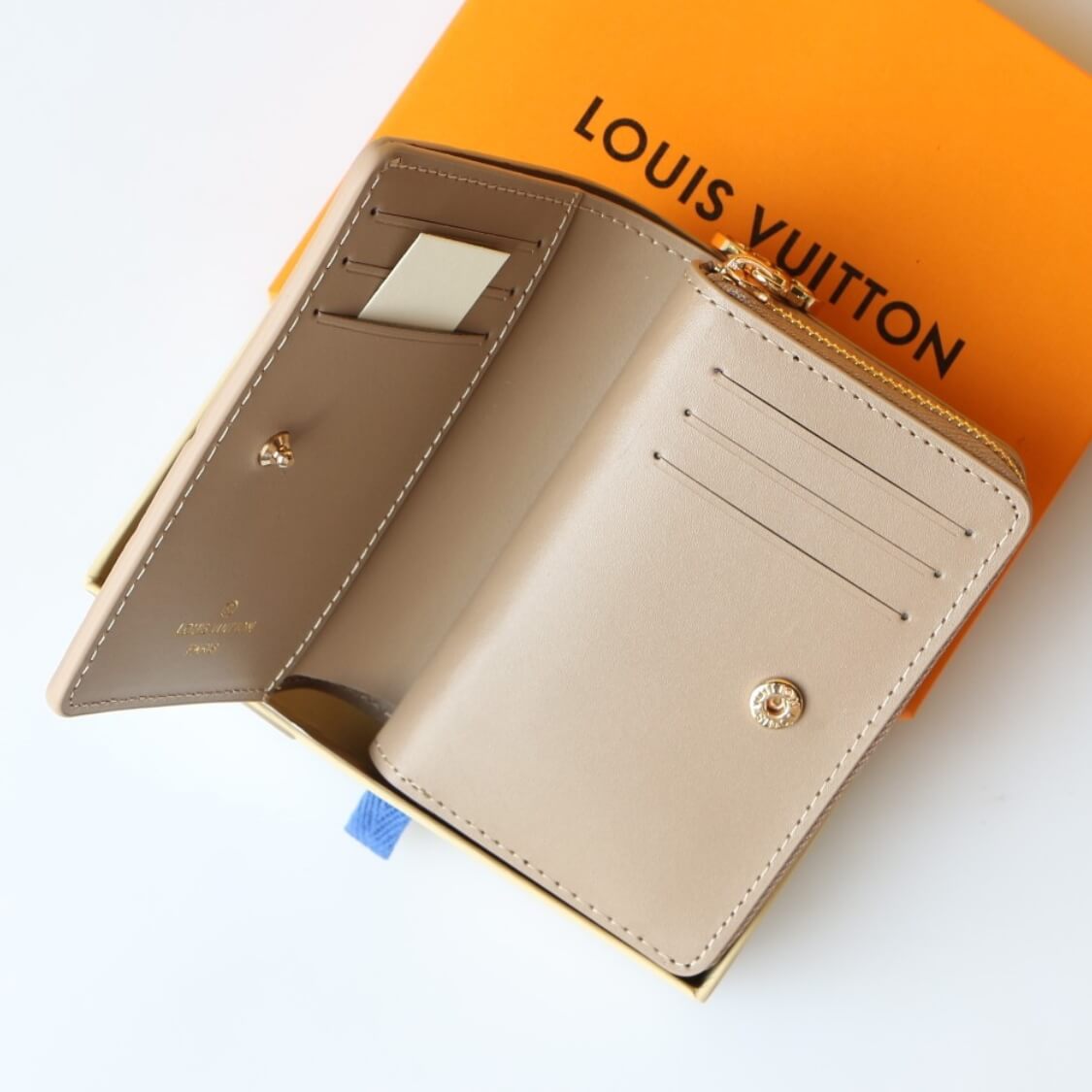 Small Embossed Zip Around Wallet