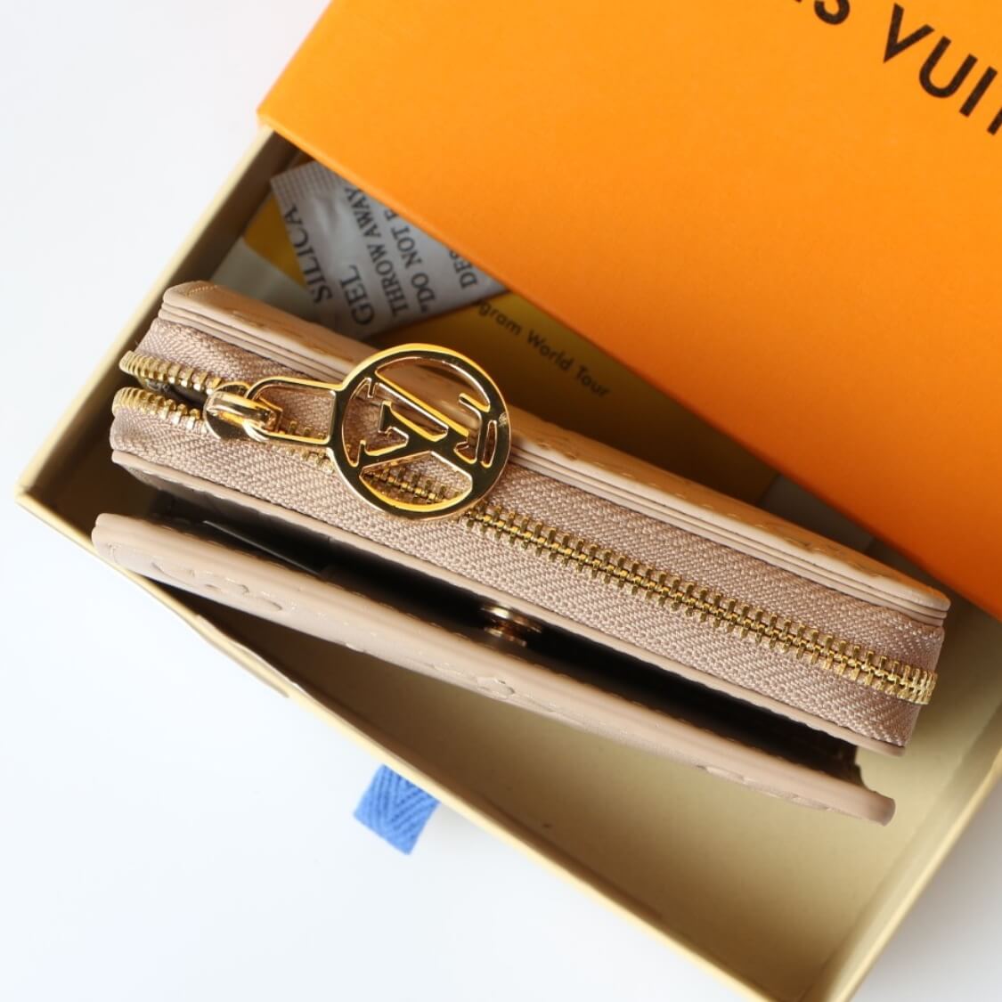Small Embossed Zip Around Wallet