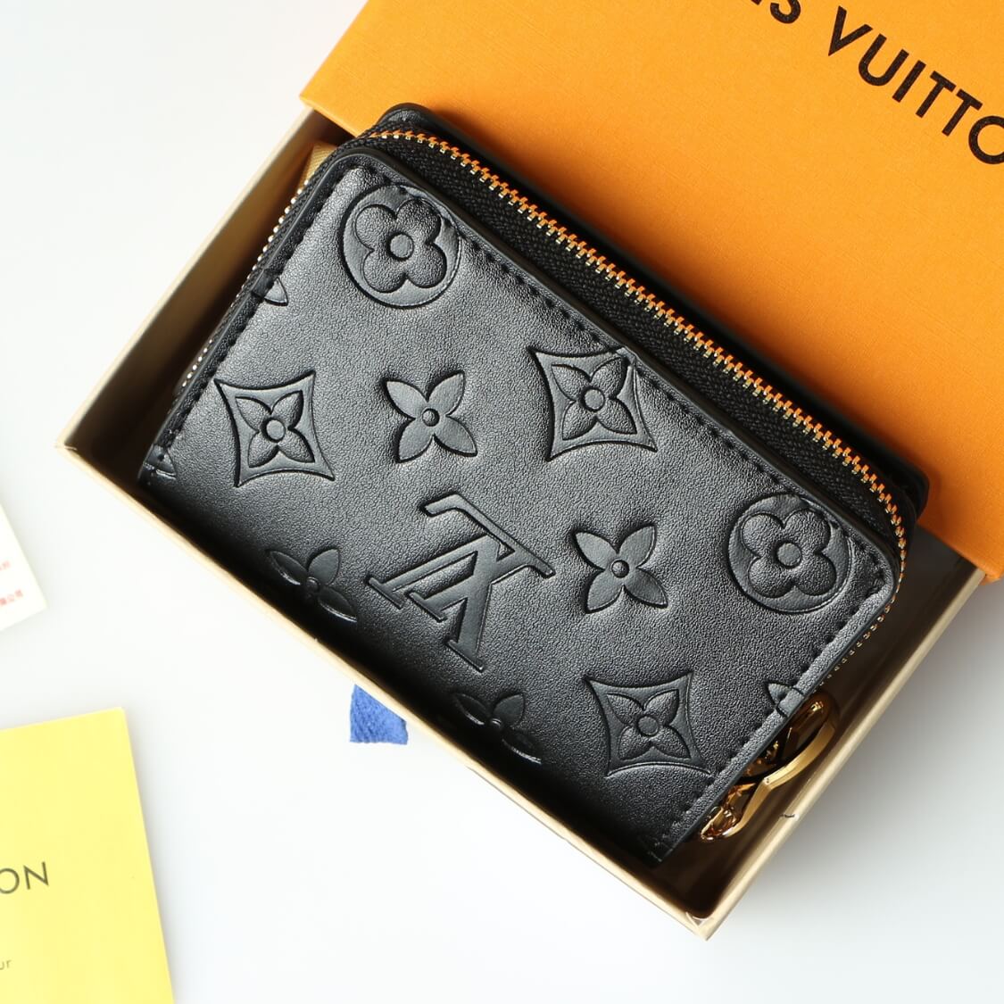 Small Embossed Zip Around Wallet In Black