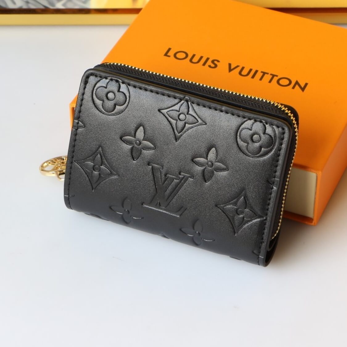 Small Embossed Zip Around Wallet In Black