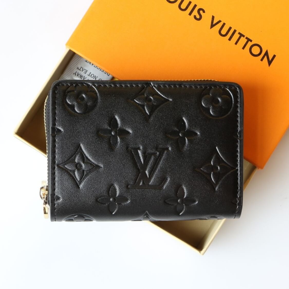 Small Embossed Zip Around Wallet In Black