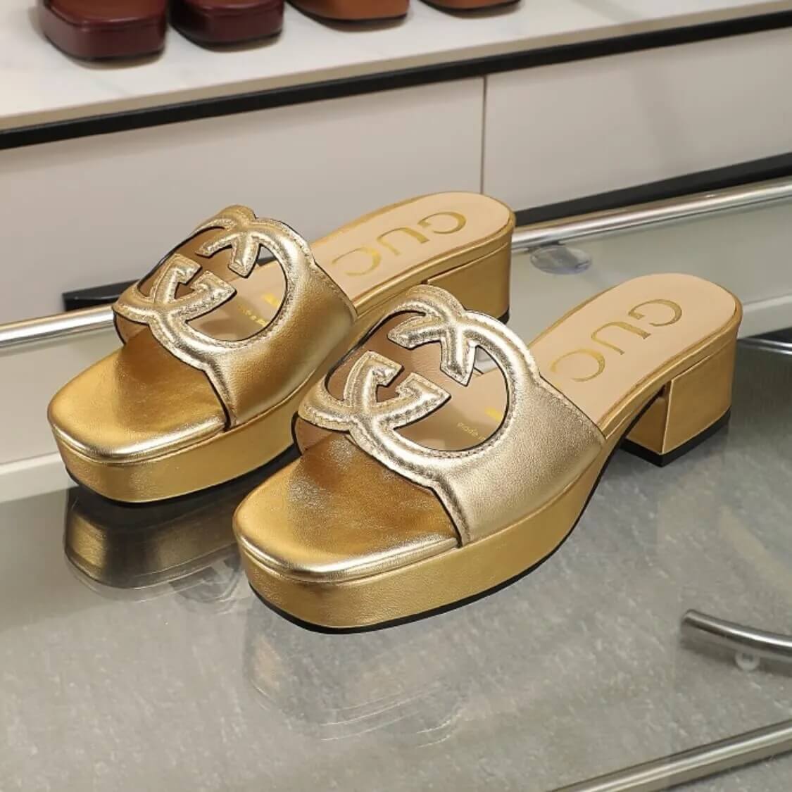 Cut Out Logo Mule Sandals In Gold