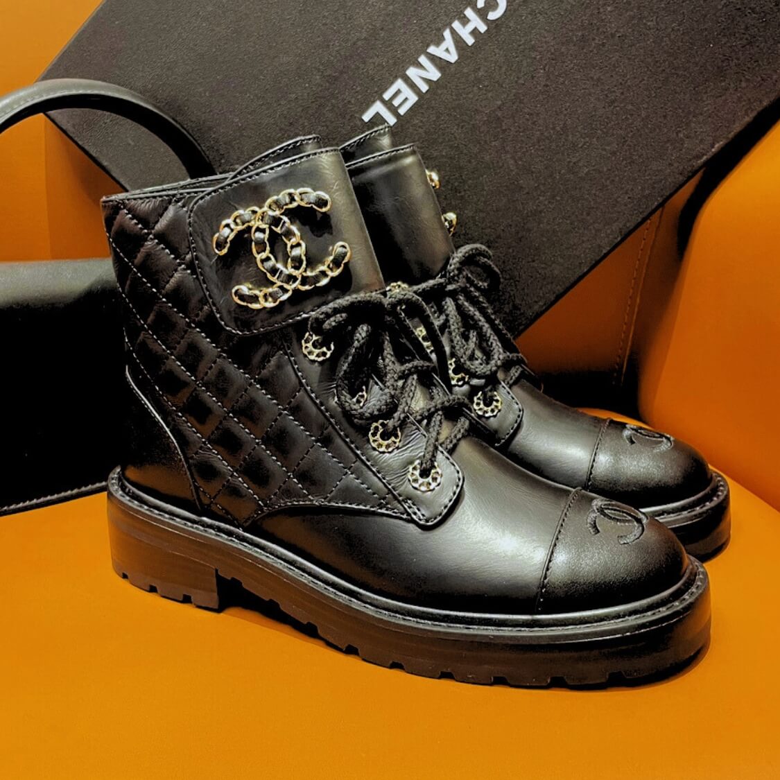 Platform Charm Logo Combat Boots In Black